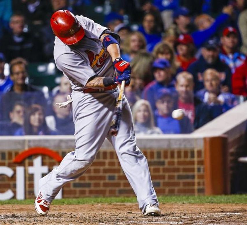 6-3. Molina impulsa un par de carreras en el triunfo de los Cardenales sobre los Rockies