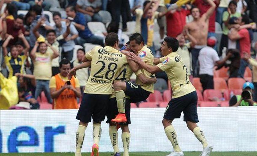 El América mantiene el paso perfecto con gol de Peralta al último minuto