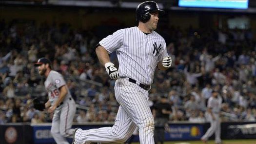9-6. McCann pega grand slam contra los Astros