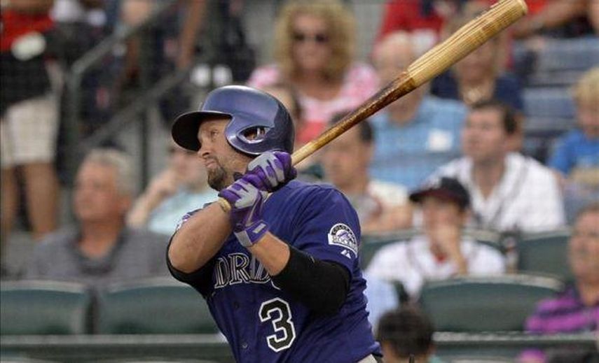 15-3. Cuddyer pega grand slam para los Rockies