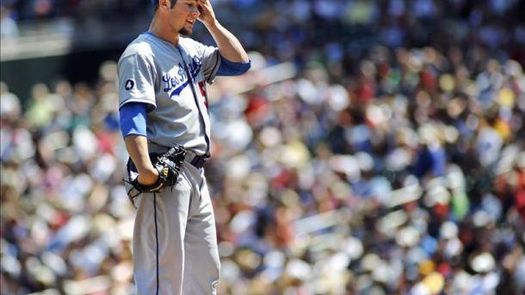 7-4. Morneau lidera el triunfo de los campeones Dodgers