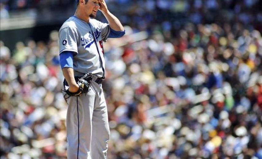 7-4. Morneau lidera el triunfo de los campeones Dodgers