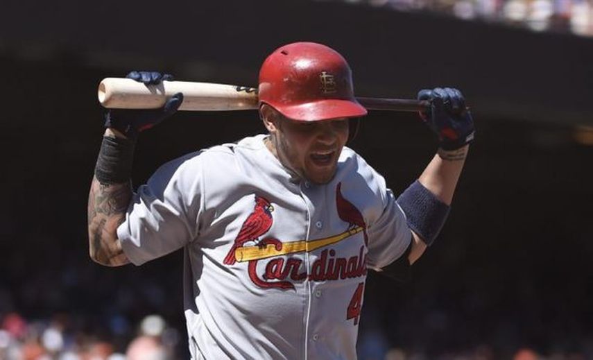 10-4. Molina remolca cuatro y los Cardenales empatan por el comodín