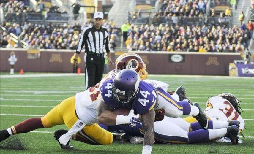 29-26. El corredor Asiata cortó la racha ganadora de los Redskins