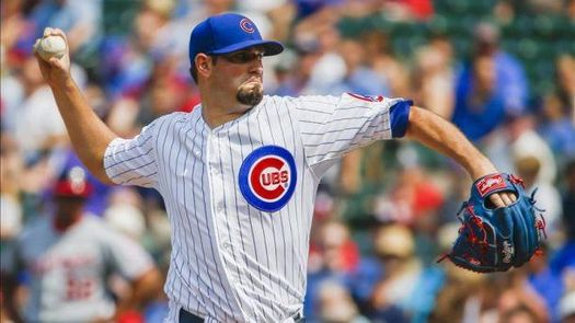 7-6. Hammel tiene el respaldo de una lluvia de jonrones y vence a los Cerveceros