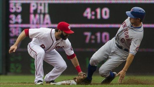 7-4. Den Dekker impulsó la carrera ganadora de los Mets